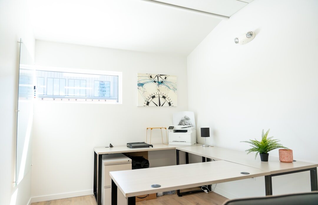 Modern startup office with open workspace and tech equipment